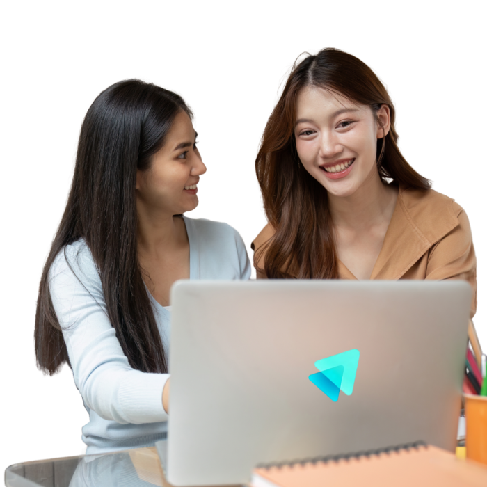 two women discussing in front of computure with smile face.